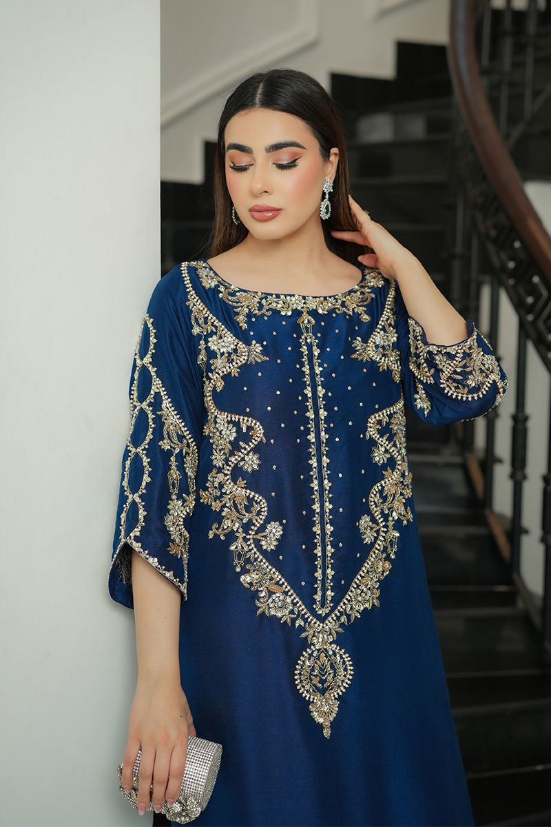 SAPPHIRE GLOW by Uzma and Afsheen sold